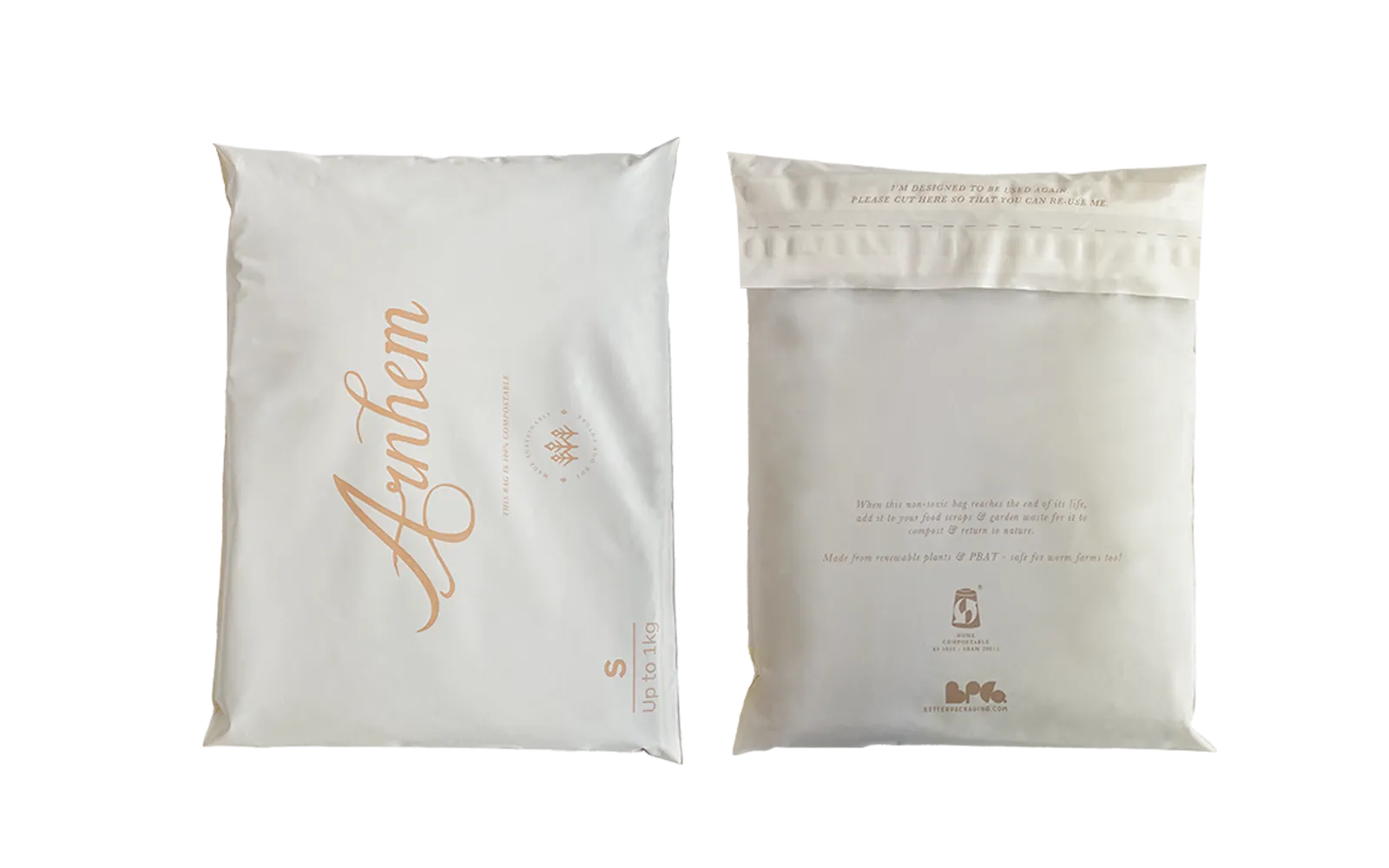 Two white packaging bags with gold text on a white background